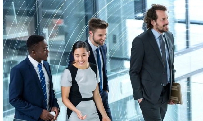 Office workers walking to the right